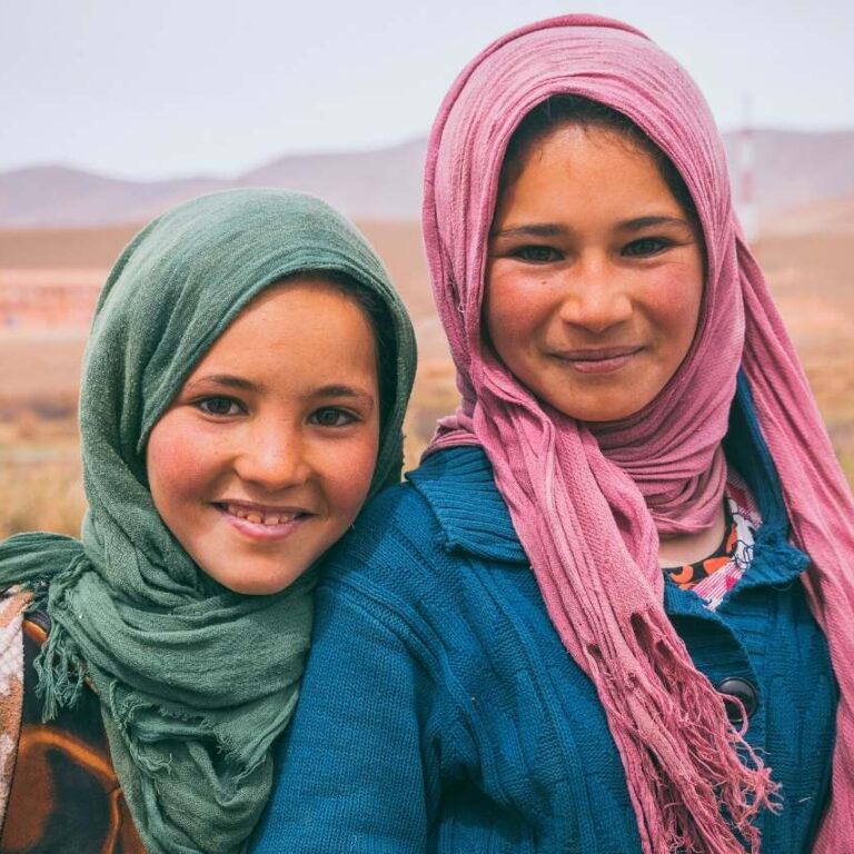 How do I dress as a female traveler in Morocco?